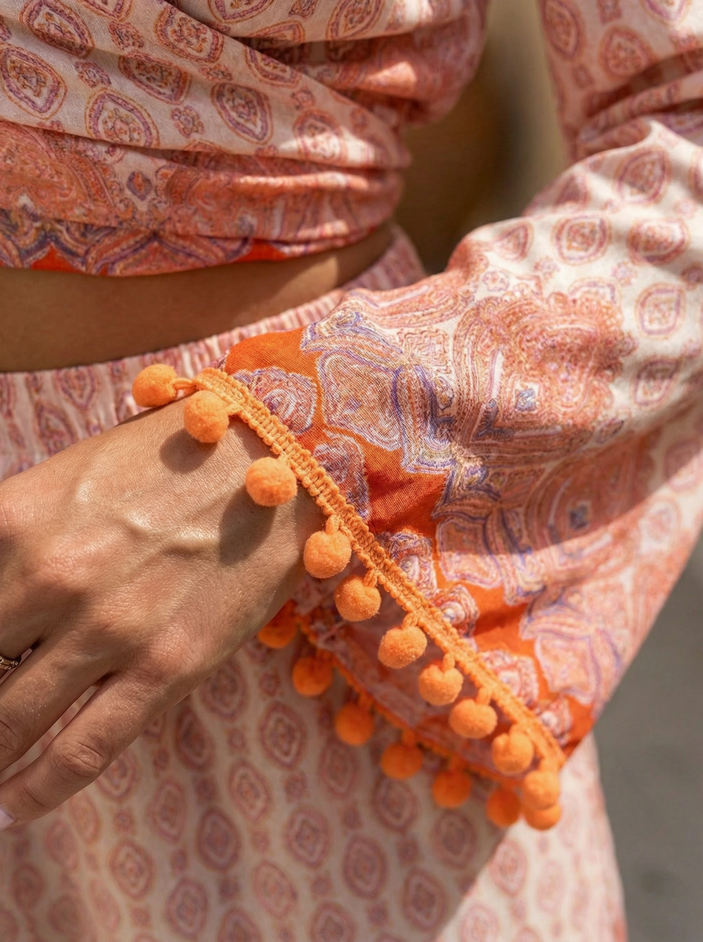Coral Wrap Top and High-Waisted Shorts Patterned Set with Orange Pompoms
